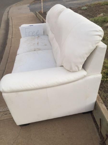 White 2 seater leather lounge