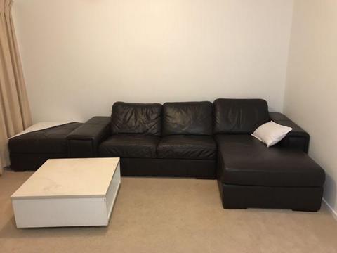 Leather couch with chaise and ottoman