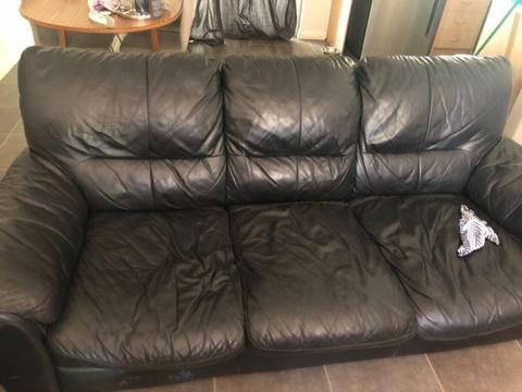 2x black leather couches
