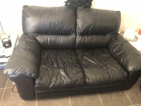 Black leather couches good condition