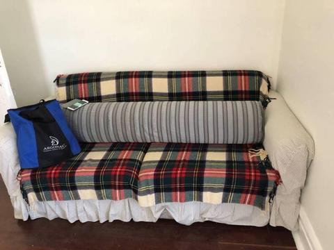 sofa and one singe bed with mattress