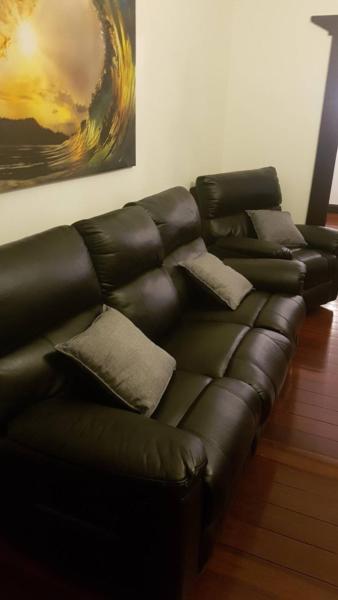 COUCH 3 piece suite black leather sofa and 2 reclining chairs