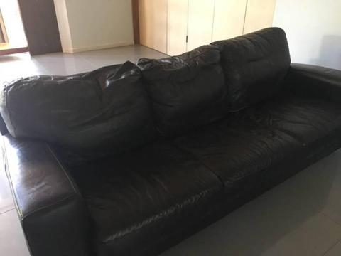 leather lounge with movable ottoman