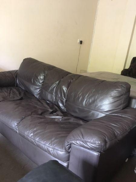 Three seater faux leather couch