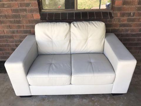 2 Seater Cream PU Leather Couch -Near New