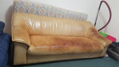 Leather Couch/sofa. No tears. Good condition other than staining