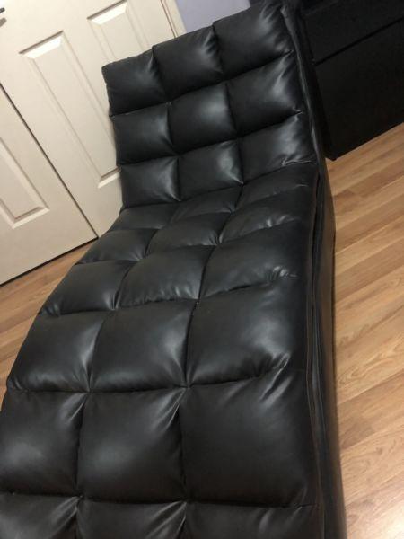 Black chaise lounge