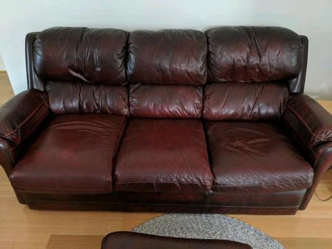 Brown leather sofa and armchairs