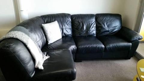 Black leather couch, 4 seater, very good condition