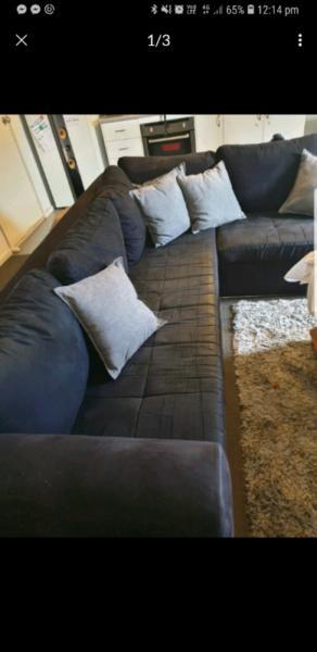 Black 7 seater couch, L shape