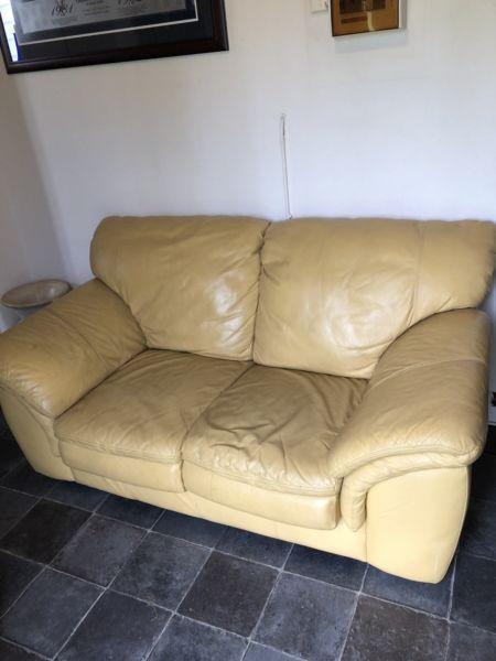 Two seater leather lounge