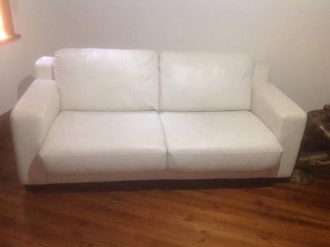 White leather sofa bed