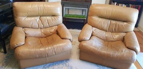 Leather lounge suit, 2 seater couch and 2 arm chairs