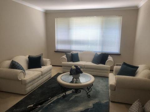 White jacquard lounge room suite