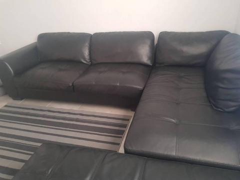 6/ 7 seater Leather couch with ottoman