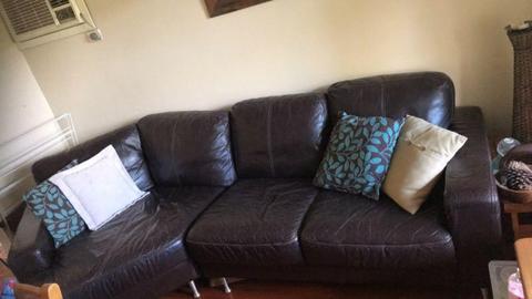Brown Italian leather couch. 3-seater. Corner type shape. GC
