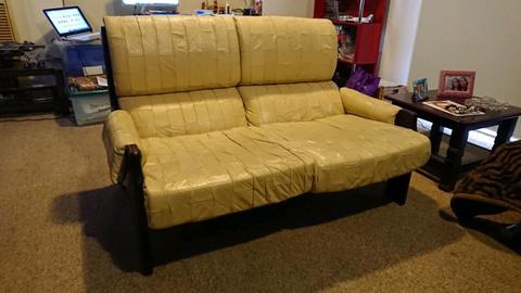 Leather couch with wooden frame