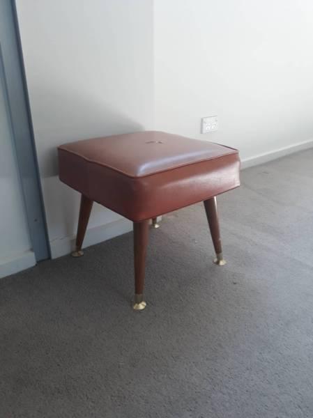 Antique stool with splayed cigar legs