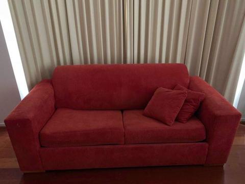 Red fold out sofa
