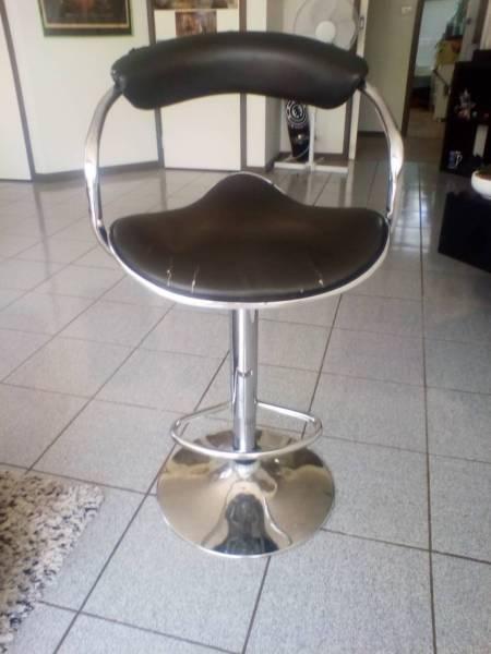 Black leather & steel bar stool in good condition