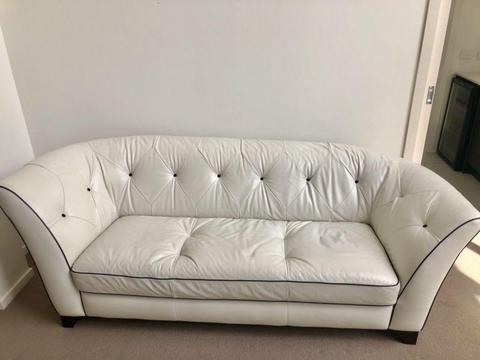 Stunning provincial leather love couch. MUST collect by Tuesday
