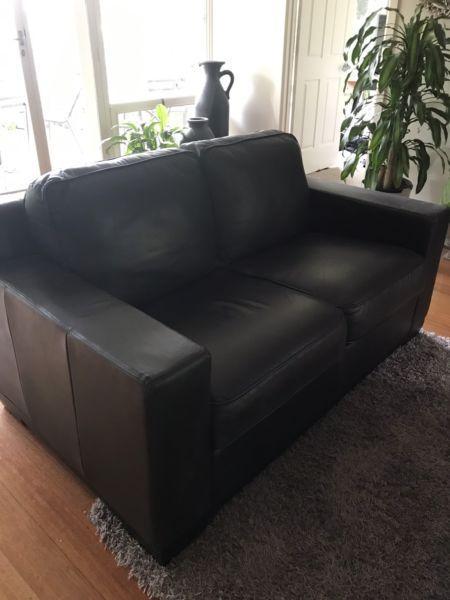 2seater chocolate leather couches As New