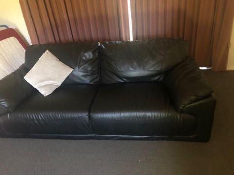 Black fake leather couch
