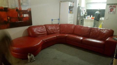 Large Red Leather Lounge in good condition