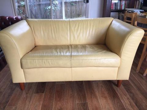 Butter yellow leather sofa (2 seater)