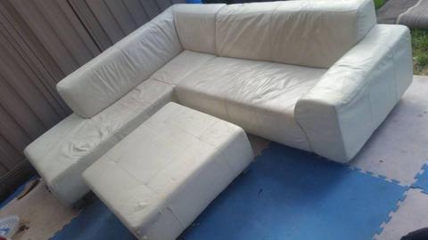 White leather L shape sofa with Ottoman