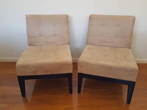 Used pair of single seat couches