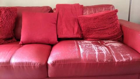 Sofas, two red