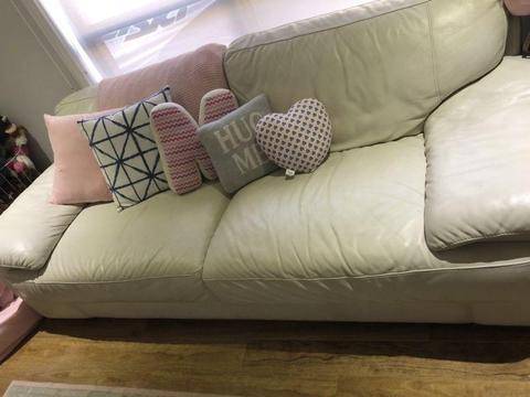 White 2 seater leather sofa