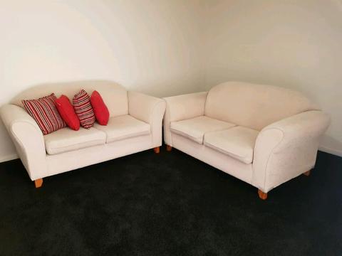 Good condition 2 Cream (off-white) 2 seater sofas
