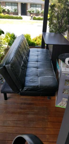 Black fold out sofa