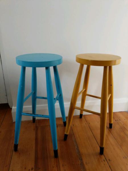 Two colourful retro wooden kitchen / bar stools