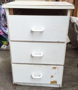 White bedside table, with three spacious drawers