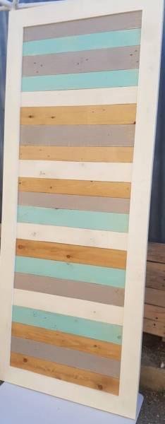 Colourful barn door made to order with pallet wood insert
