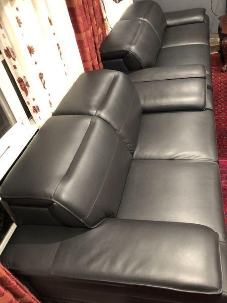 2x2 seater black leather sofa