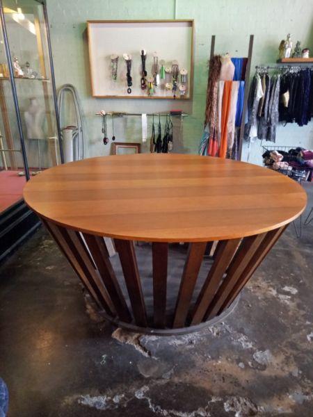Large circular wooden display table