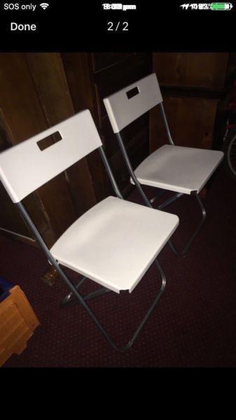 Brand New White fold out chair $20 each