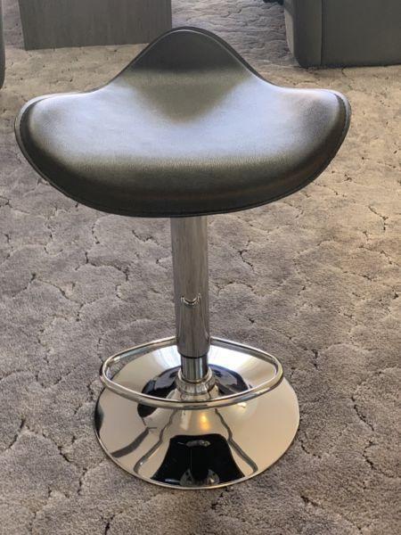 Swivel stool with foot rest - adjustable height