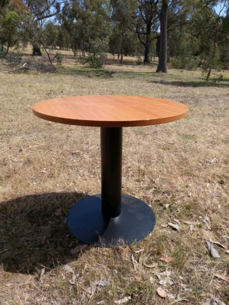 Brown wooden office table with black metal base