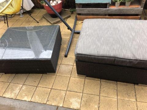 Outdoor seat and glass top table