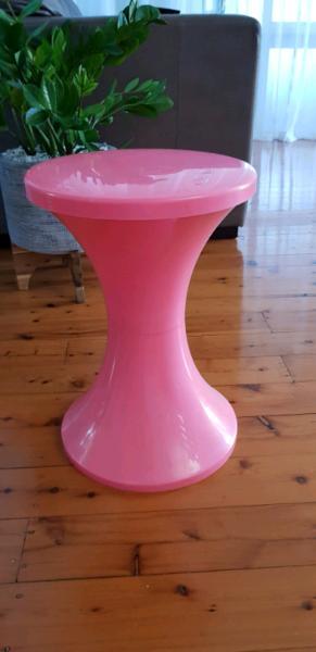 Pink plastic stool