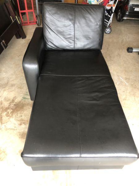 Black leather chaise lounge
