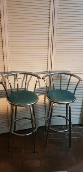 2 silver swivel bar stools
