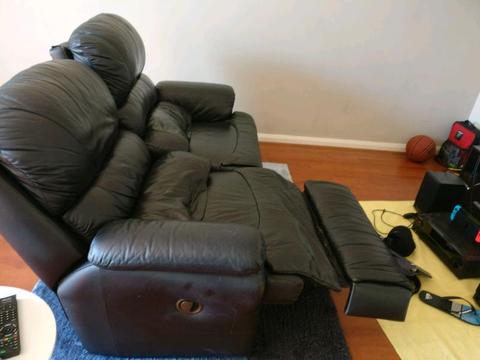 2x single black leather couches $75