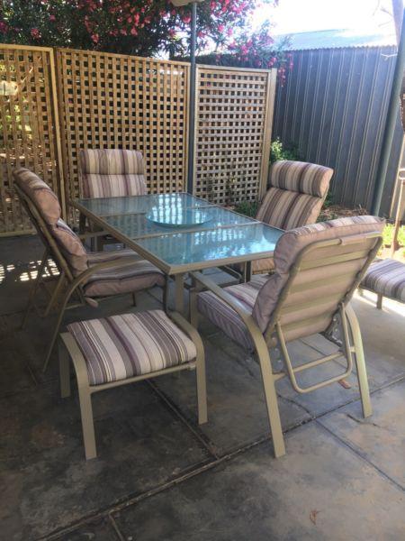Outdoor glass table 4 chairs 2 footstools