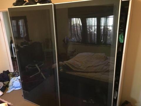 IKEA Pax black glass doors and wardrobe